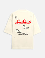 Beige t-shirt with humorous text design on a white background